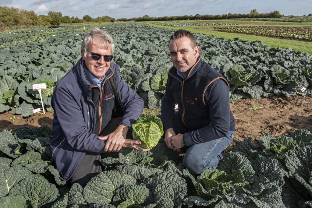 Andrew Vincent and Justin Solly in a field representing British seed suppliers Elsoms